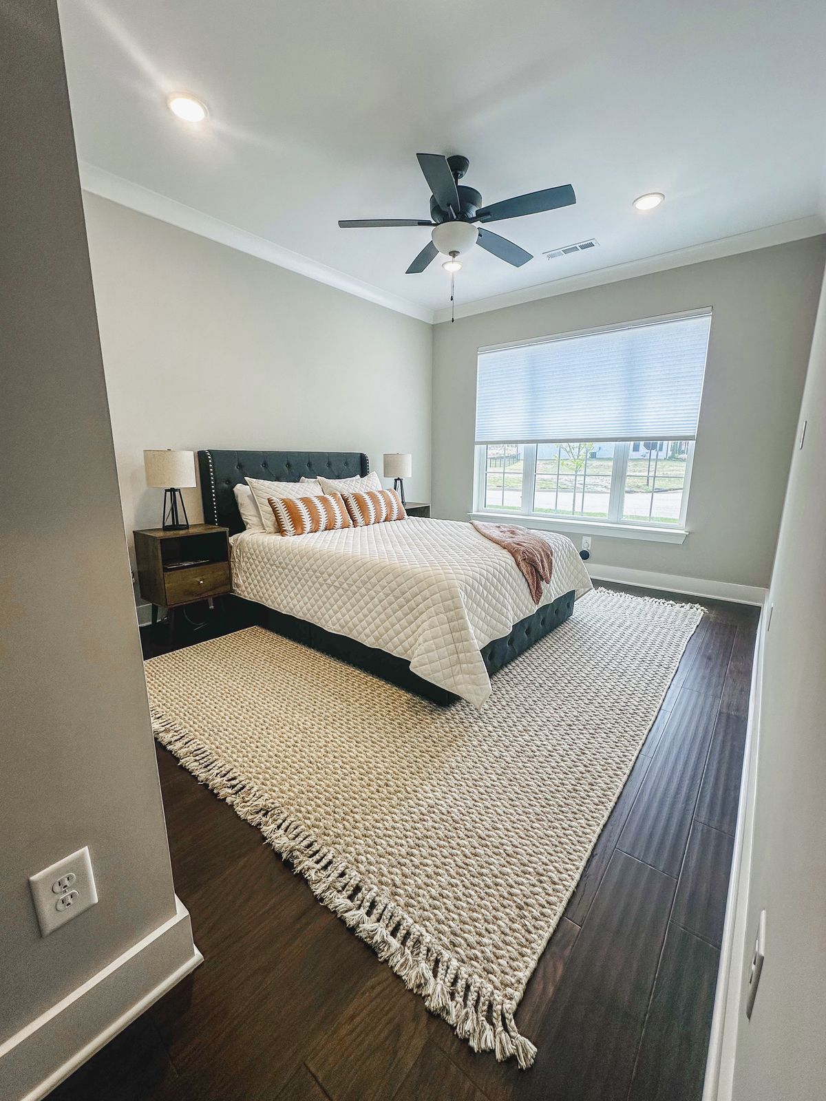 Fresh clean bedroom with cream bedding